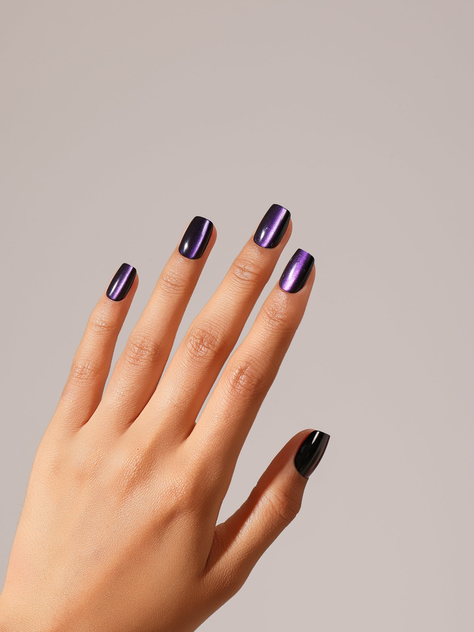 Full set showing Berry Luxe short square cat eye press-on nails deep berry shimmer glow