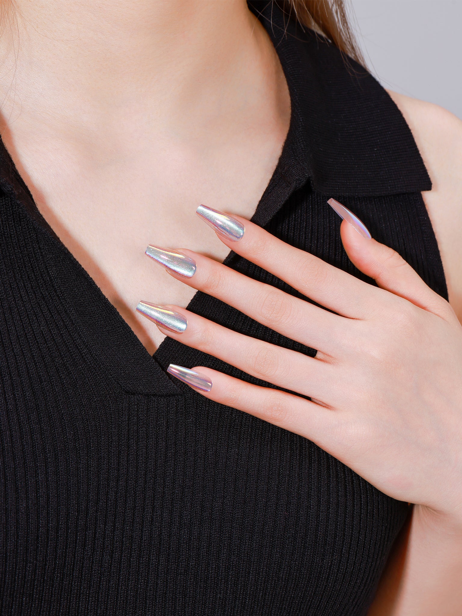 Both hands showing Dreamlight Chrome iridescent chrome acrylic press-on nails photo-ready shine