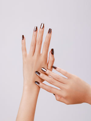 Close-up of Silken Cocoa PMMA acrylic short square brown press-on nails with high-shine topcoat