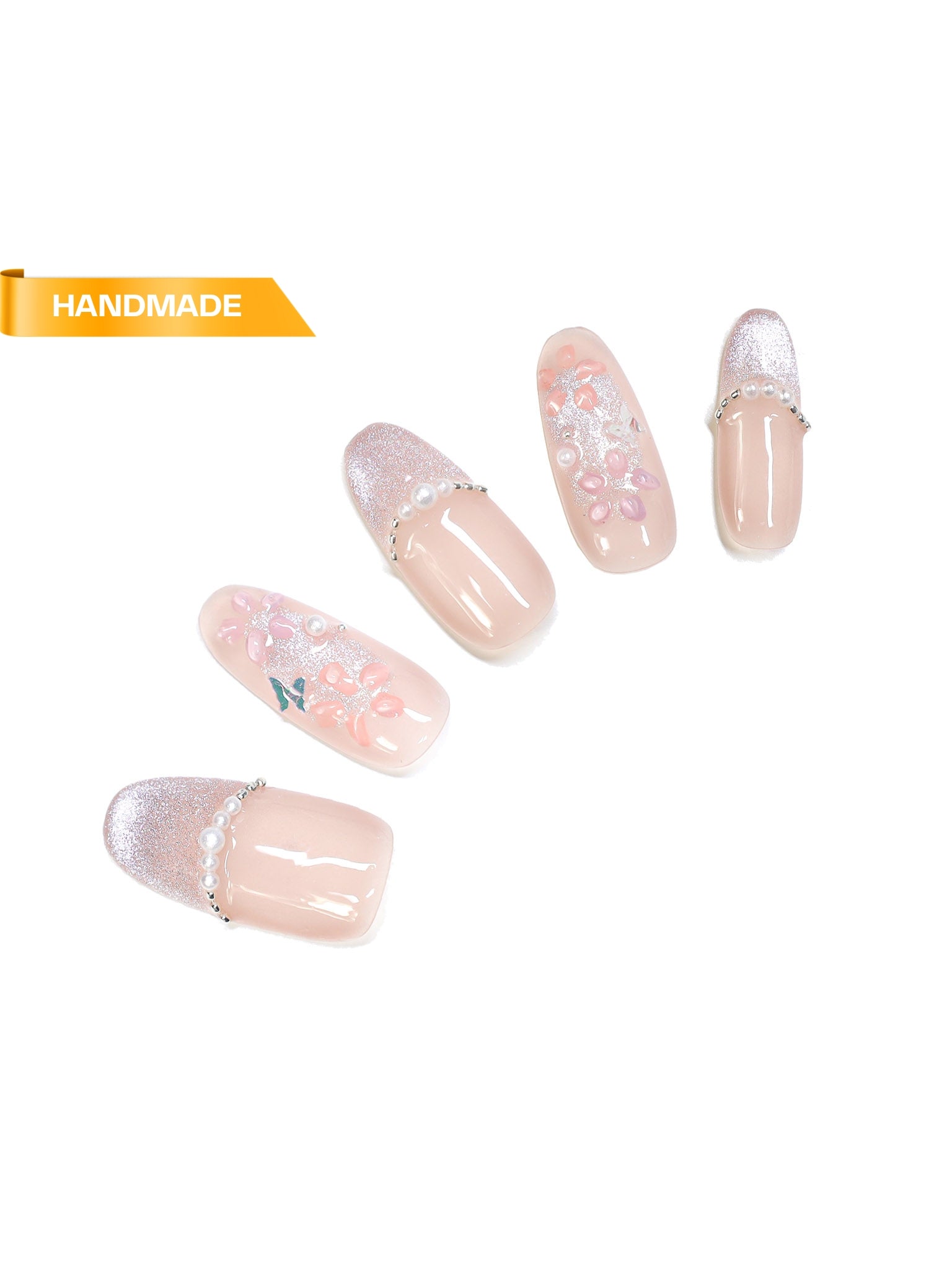 Handmade almond press-on nails in blush nude with silver glitter tips, 3D floral accents, and pearl detailing on white background