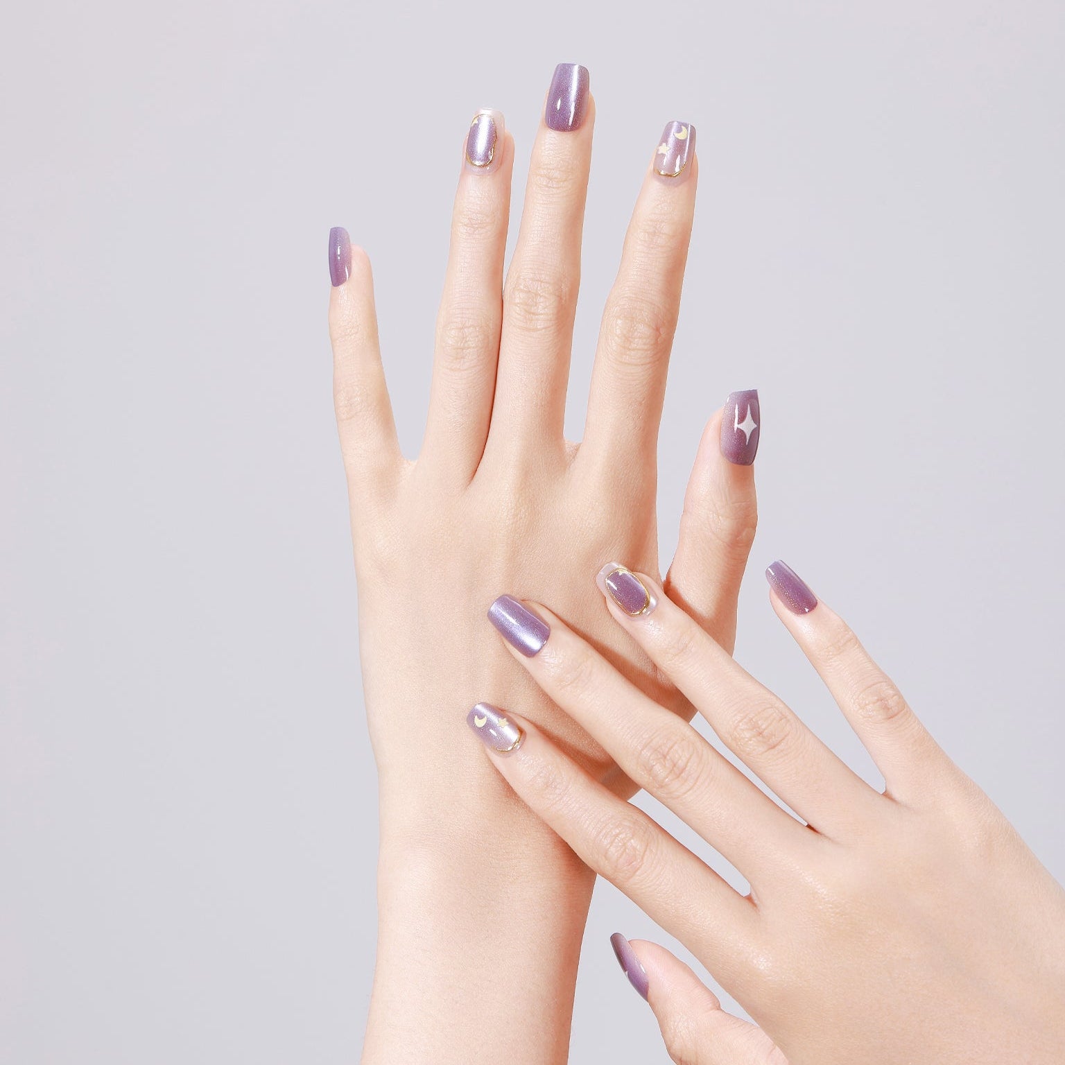 Purple Stardust short square purple galaxy press-on nails with moon and star nail art