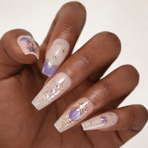long lavender celestial press on nails with gold star accents, rhinestones, and glossy uv gel acrylic finish