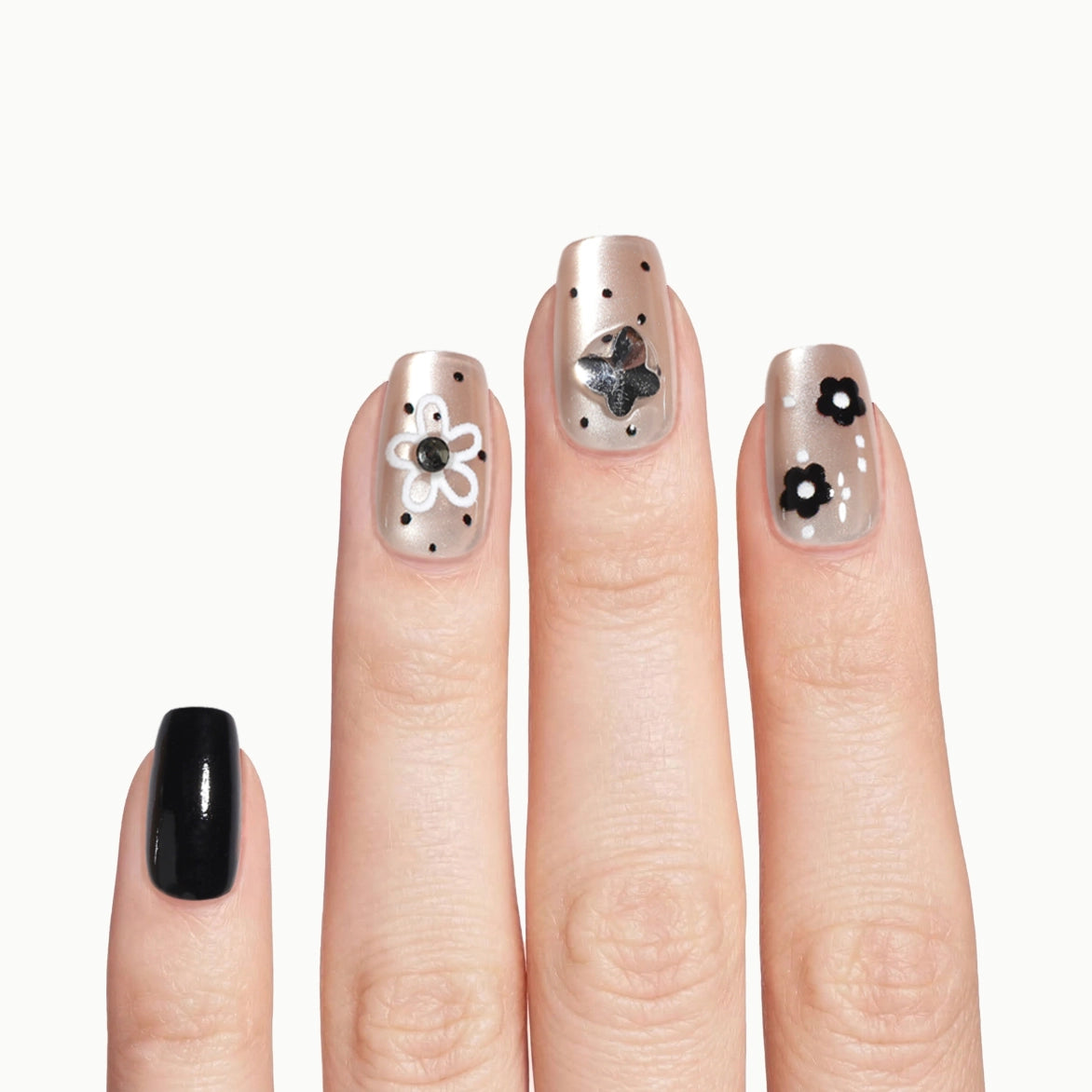 Gloss Bloom – Square Nude Floral Press-On Nails with Glossy Black Accents & Rhinestone Detail