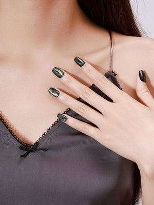 Close-up of Evil Eyes short square PMMA acrylic press-on nails with evil eye design